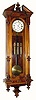 C.1880, Austrian, 3-Wt Grand Sonnerie wall clock in a walnut case with reeded half columns with Corinthian capitals,