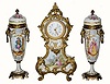 C.1900, French, 3 piece porcelain set, 8-day. This small set is in excellent condition.