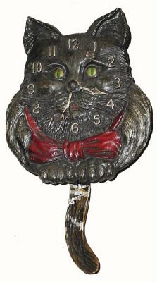 C.1937, Lux Clock Mfg. Co., Waterbury, Conn., "Cat", 30-hour novelty timepiece. — Antique Clocks Price Guide