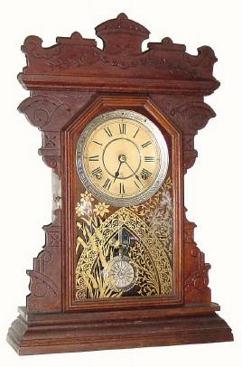 C.1890, Seth Thomas Clock Co., 8-day walnut gingerbread clock. — Antique Clocks Price Guide