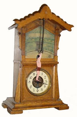 C.1900, German, Junghans, ACROBAT novelty automaton, with replaced acrobat. — Antique Clocks Price Guide