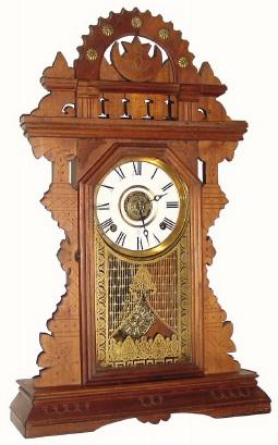 C.1885, E.N. Welch Mfg. Co., "Eclipse", 8-day time/strike/alarm gingerbread clock. — Antique Clocks Price Guide