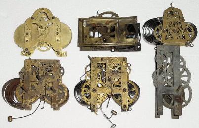 Lot of 6 American spring-driven wall and shelf clock movements: — Antique Clocks Price Guide