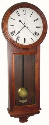 C.1914, Ansonia Clock Co., "COLONEL" wall regulator in black walnut and in very good condition. — Antique Clocks Price Guide