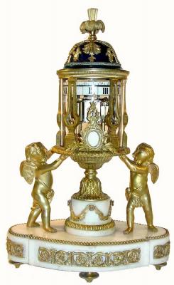 C.1875, French, Ormolu and White Marble Temple motif clock with revolving annular dials, — Antique Clocks Price Guide