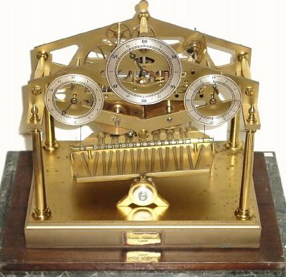 C.1960, English, Charles Frodsham and Co, London, Rolling Ball clock and cover, — Antique Clocks Price Guide