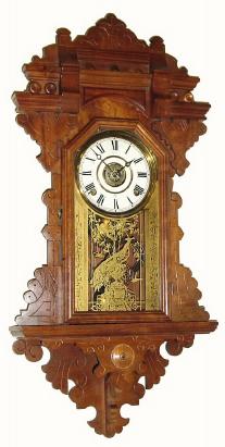 C.1890, E. Ingraham and Co., Hanging Walnut gingerbread alarm, with restoration. — Antique Clocks Price Guide