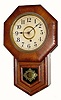 C.1905, Ansonia Clock Co, Oak veneer miniature drop octagon with rounded sides and in good original condition,