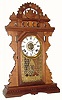 C.1885, E.N. Welch Mfg. Co., "Eclipse", 8-day time/strike/alarm gingerbread clock.
