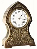 C.1911, Ansonia Clock Co., "Nile", brass plated iron cased, 8-day time/strike mantel clock, in good original condition.