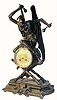 C.1860, French, Bronze Figural Clock, "A Bat Man" with drum sticks.