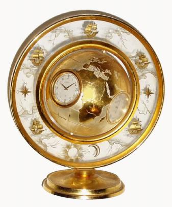 C.1965, Angelus, Swiss, 8-day time-barometer-hygrometer-thermometer, Globe desk time-piece in generally good condition. — Antique Clocks Price Guide