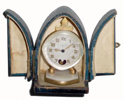 C.1920, French, Lenox Watch Co, ladies dressing table clock with visible "heartbeat" escapement, and with original presentation/travel box — Antique Clocks Price Guide