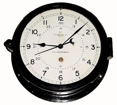 C.1945, Chelsea Clock Co., Boston, Marine lever timepiece, with 12 and 24 hour dial and center seconds hand, in a black Bakelite case. — Antique Clocks Price Guide