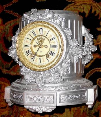 C.1900, Ansonia, FLORIDA base, as-found, painted with aluminum spray paint. — Antique Clocks Price Guide