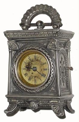 C.1890, Parker and Whipple, Meriden, Ct, Hotchkiss patent 30 hour timepiece in a cast white metal case with Egyptian motif. — Antique Clocks Price Guide