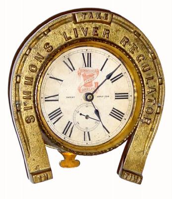 C.1900, Ansonia Advertising Novelty "Simmons Liver Regulator", in very good original condition. — Antique Clocks Price Guide
