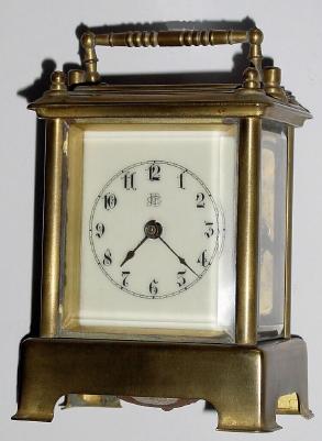 C.1905, Waterbury Clock Co., "Conductor", brass cased carriage clock in fair to good condition. — Antique Clocks Price Guide