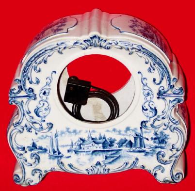 Case only, C.1900, Blue and White Delft Style porcelain case with base board and gong, but no movement. — Antique Clocks Price Guide