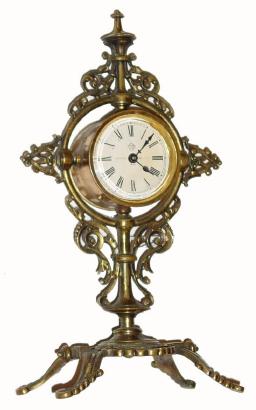 C.1904, Ansonia "IRIS" cast novelty clock, 1-day time. — Antique Clocks Price Guide