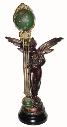 C.1905. Ansonia Clock Co., New York "Gloria" ball swing clock. — Antique Clocks Price Guide