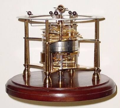 C.1980, Swiss for Franklin Mint, an annular dial orrery clock in good original condition, less dome — Antique Clocks Price Guide