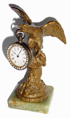C.1905, Ansonia, EAGLE, watch holder and watch in generally good condition, — Antique Clocks Price Guide