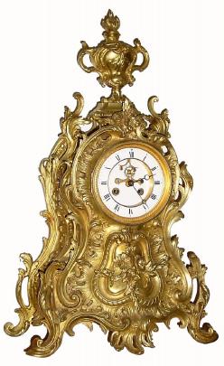 C.1870, French, Napoleon III, Fanciful Bronze clock, 8-day time and strike, with open escapement on the dial and in good original condition. — Antique Clocks Price Guide