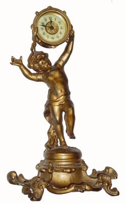 C.1900, Ansonia TAMBOURINE, in good original condition with porcelain dial. — Antique Clocks Price Guide