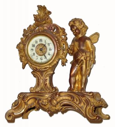 C.1906, Ansonia, AMOUR, cast metal novelty clock in good original condition. — Antique Clocks Price Guide