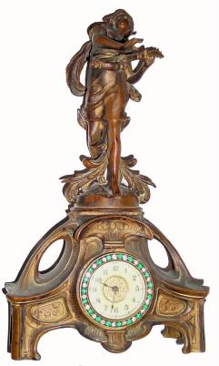 C.1900, New Haven Clock Co., Cast metal figural clock in very good original condition. — Antique Clocks Price Guide