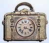 C.1892, E. N. Welch, "Little Grip", suitcase novelty, with damaged handle (ring on left side broken), and rear winder missing.