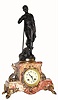 C.1890, French Figural Clock, Le Repos, or "The Repose", showing a farmer in overalls resting with his bare foot an a scythe after a hard day in the field.