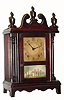C.1925, Gilbert, Miniature Pillar and Scroll, 8-day, time and strike and in excellent original condition.
