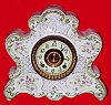 C.1915, Ansonia, Dresden Porcelain clock, made to specs as a promotional item, and in very good original condition.