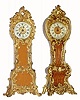 C.1900 (LOT OF 2), Ansonia Irene and Clarice, two oak cased miniature Baroque tall clocks with cast metal gold colored trim.