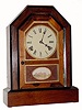 C.1870, Jerome and Co., (New Haven), Rosewood, 8-day, octagon top shelf clock with gutta purcha surround for the dial and lower tablet.