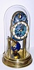 C.1954, German, J. Kaiser, 400-Day clock, World model, with terrestrial globe pendulum and Halifax moon revolving in the arch of the dial.