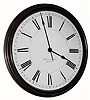 C.1920, E. Howard and Co., Boston, a large bronze bezel slave clock with 16" signed dial.