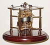 C.1980, Swiss for Franklin Mint, an annular dial orrery clock in good original condition, less dome