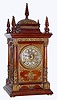 C.1894, Ansonia, CABINET ANTIQUE, with French sash and fancy dial with individual chevron numerals (all intact).