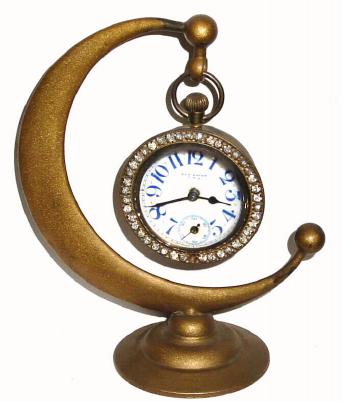 C.1913, New Haven Clock Co., "Jasper and Crescent Stand" novelty timepiece. — Antique Clocks Price Guide