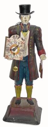 C.1965, German Clock Peddler with clock, cast white metal, painted in mid 19th century attire. — Antique Clocks Price Guide