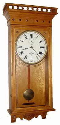 A C.1900, Self Winding Clock Movement "Model B", now in a modern oak case, — Antique Clocks Price Guide