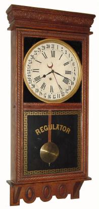 C.1918, E. Ingraham &amp; Co., "NORTHWESTERN", time &amp; calendar store regulator in good original condition. — Antique Clocks Price Guide