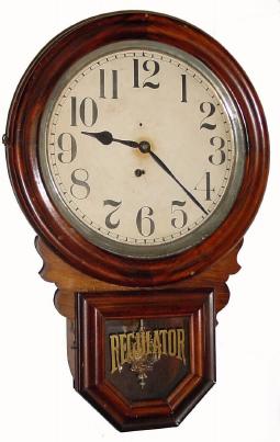 C.1905, E. Ingraham &amp; Co., "Dew Drop", 8-day wall timepiece in very nice condition with original grain painting on the doors. — Antique Clocks Price Guide