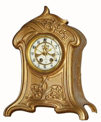 C.1913, William L. Gilbert Clock Co., "Euclid", 8-day time/strike mantel clock in a cast metal case in nice clean condition — Antique Clocks Price Guide