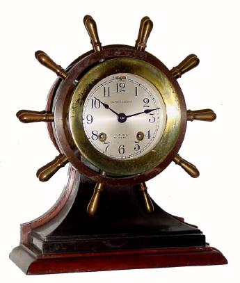 C.1940, Chelsea Clock Co., "Mariner", 8-day brass and bronze case ship's bell clock in generally good condition, the case with tarnish, but with a very clean original dial and hands. — Antique Clocks Price Guide