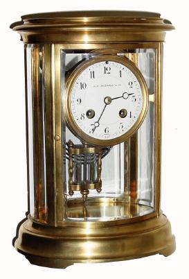 C.1910, French, for J. E. Caldwell &amp; Co., Philadelphia, signed on the dial and imprinted on the movement, oval crystal regulator in generally good condition. — Antique Clocks Price Guide