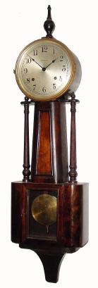 C.1920, E. Ingraham &amp; Co., "Nile", 8-day time/strike banjo wall clock in very nice condition with an original finish that is worn in places. — Antique Clocks Price Guide